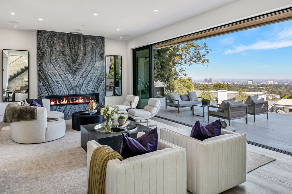 The Home in Pacific Palisades is a new contemporary home personifies abstract reductionist minimalism perched above the trees in the highly coveted Riviera now available for sale. This home located at 1635 Casale Rd, Pacific Palisades, California