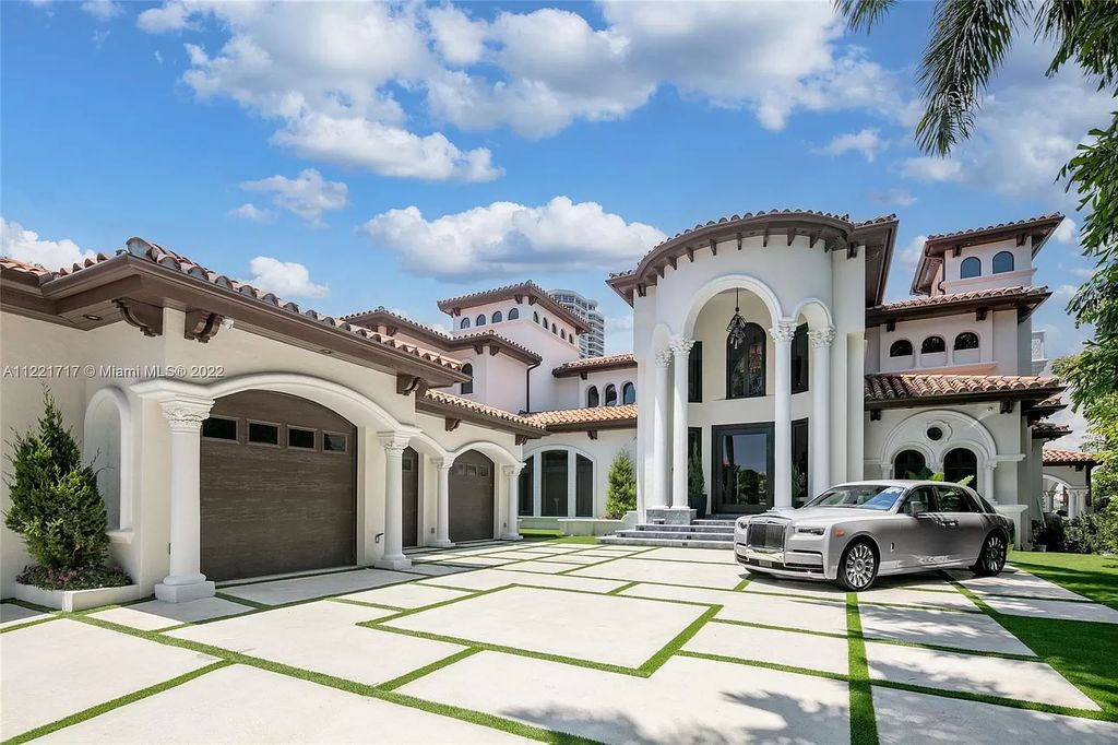 The Home in Golden Beach is an ultra-lavish waterfront palatial estate is set behind private gates at the end of a cul de sac now available for sale. This home located at 498 North Pkwy, Golden Beach, Florida