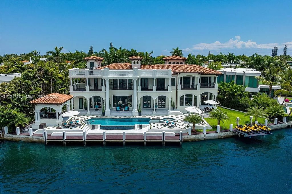The Home in Golden Beach is an ultra-lavish waterfront palatial estate is set behind private gates at the end of a cul de sac now available for sale. This home located at 498 North Pkwy, Golden Beach, Florida