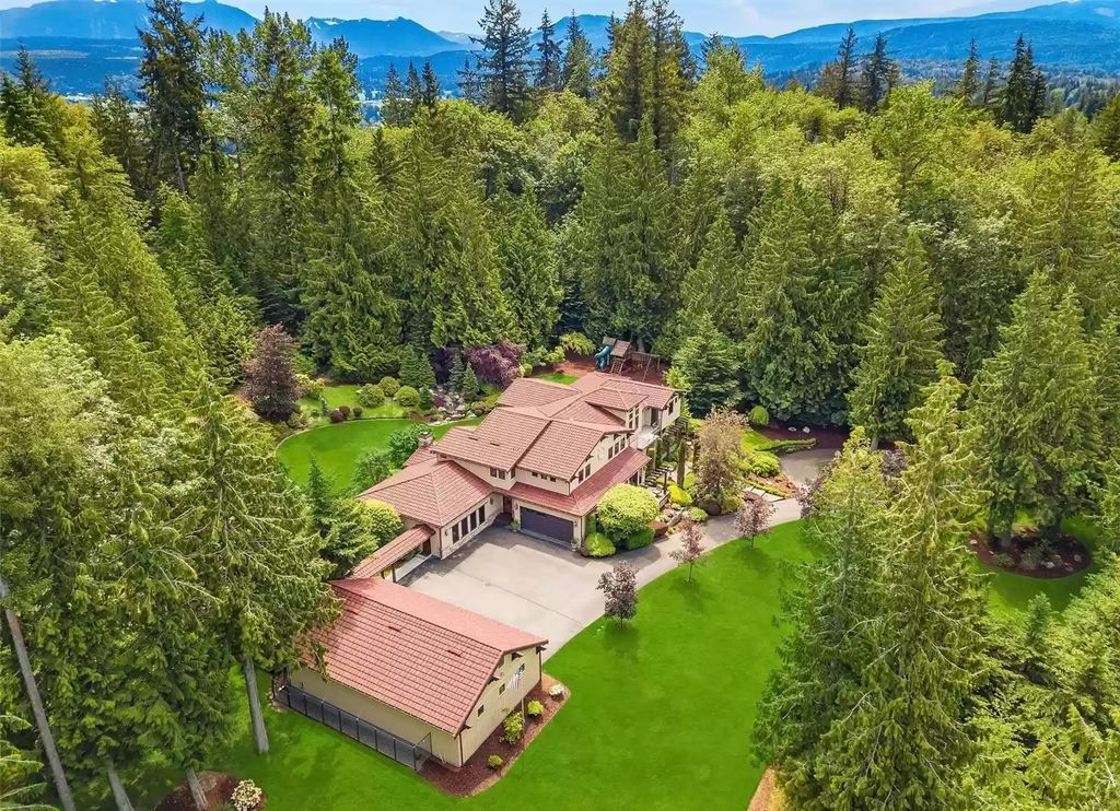 The Estate in Washington is a luxurious home with uncompromised privacy now available for sale. This home located at 1324 289th Avenue NE, Carnation, Washington; offering 05 bedrooms and 05 bathrooms with 6,824 square feet of living spaces.