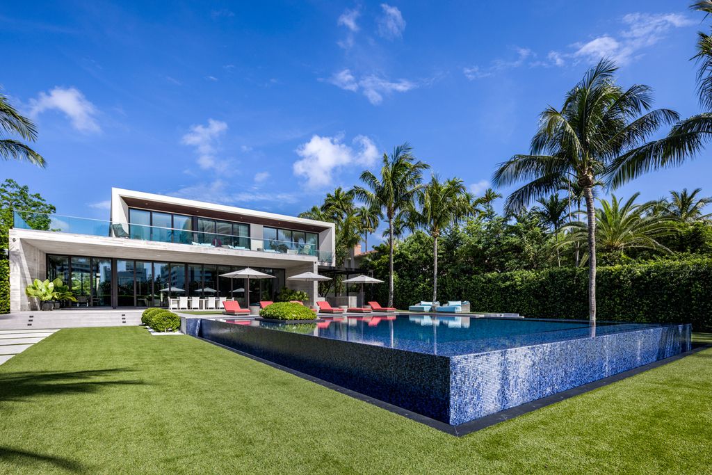 The Mansion in Miami Beach is a luxurious retreat-inspired custom built residence provides a zen ambiance with floating orchid gardens now available for sale. This home located at 4395 Pine Tree Dr, Miami Beach, Florida