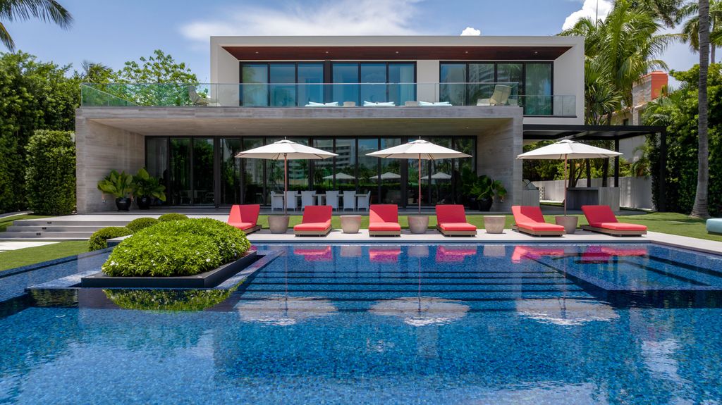 The Mansion in Miami Beach is a luxurious retreat-inspired custom built residence provides a zen ambiance with floating orchid gardens now available for sale. This home located at 4395 Pine Tree Dr, Miami Beach, Florida
