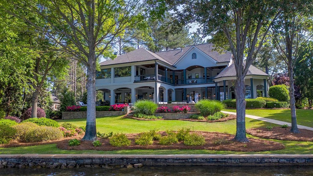The Estate in Georgia is a luxurious home situated on a gorgeous premium private lot offering spectacular water views now available for sale. This home located at 150 Wildwood Dr, Eatonton, Georgia; offering 05 bedrooms and 06 bathrooms with 6,756 square feet of living spaces.