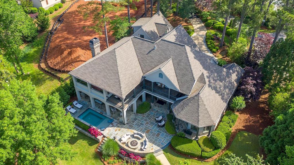 The Estate in Georgia is a luxurious home situated on a gorgeous premium private lot offering spectacular water views now available for sale. This home located at 150 Wildwood Dr, Eatonton, Georgia; offering 05 bedrooms and 06 bathrooms with 6,756 square feet of living spaces.