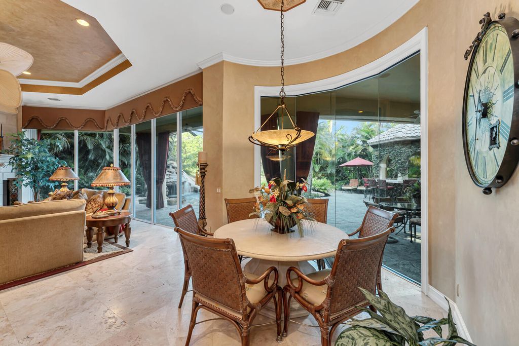 The Home in Naples is an exceptional custom home unlike any other in Watercrest with resort style outdoor area now available for sale. This home located at 2350 Cheshire Ln, Naples, Florida