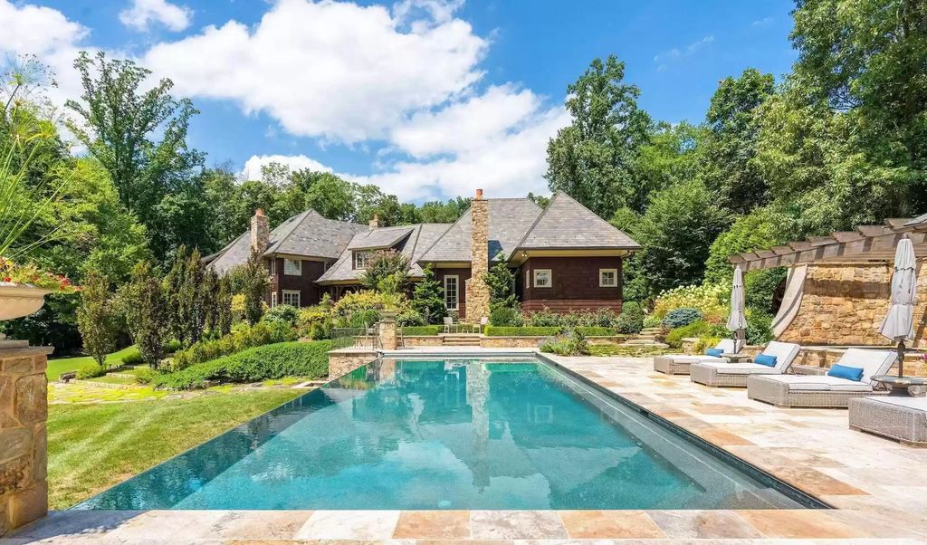 The Estate in Virginia is the fully gated estate, designed by well-known landscape designer, Charles Owen of Fine Landscapes, now available for sale. This home located at 524 Innsbruck Ave, Great Falls, Virginia