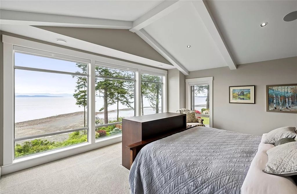The Home in Parksville is majestically set on 0.64 of an acre with a private path that leads to the beach living space below, now available for sale. This home located at 798 Fairwind Ave, Parksville, BC V9P 1B2, Canada