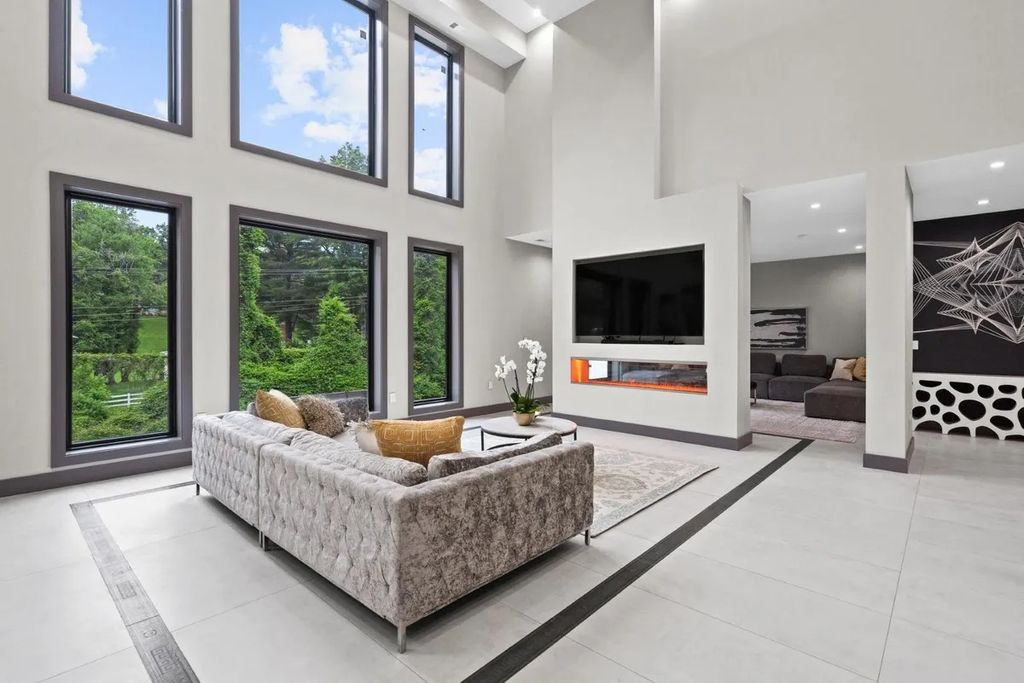 The Residence in Virginia is a modern masterpiece with the flexibility to both entertain and to live comfortably, now available for sale. This home located at 9100 Mill Pond Valley Dr, Mc Lean, Virginia