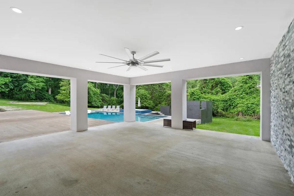 The Residence in Virginia is a modern masterpiece with the flexibility to both entertain and to live comfortably, now available for sale. This home located at 9100 Mill Pond Valley Dr, Mc Lean, Virginia