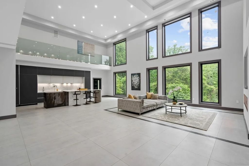 The Residence in Virginia is a modern masterpiece with the flexibility to both entertain and to live comfortably, now available for sale. This home located at 9100 Mill Pond Valley Dr, Mc Lean, Virginia