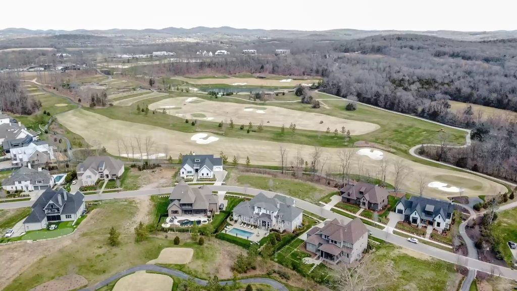 The Home in Tennessee is a luxurious home located in the exclusive Troubadour Golf & Field Club now available for sale. This home located at 7080 Lanceleaf Dr, College Grove, Tennessee; offering 04 bedrooms and 07 bathrooms with 5,842 square feet of living spaces.