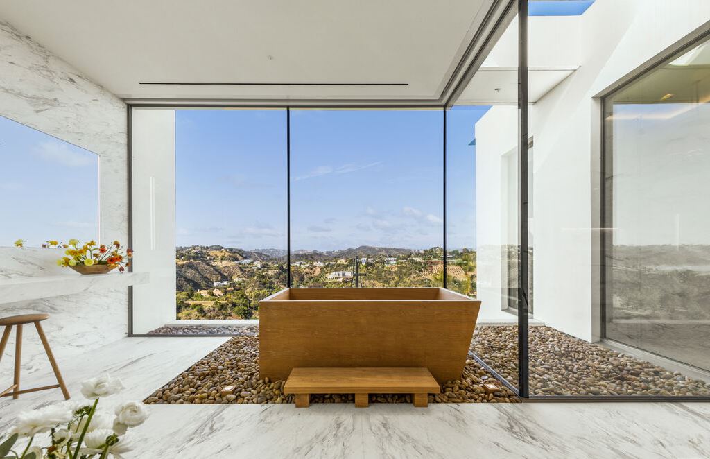 The Los Angeles Mansion is an architectural triumph that redefines luxury living in the world's most prestigious location with the best views in LA now available for sale. This home located at 10721 Stradella Ct, Los Angeles, California