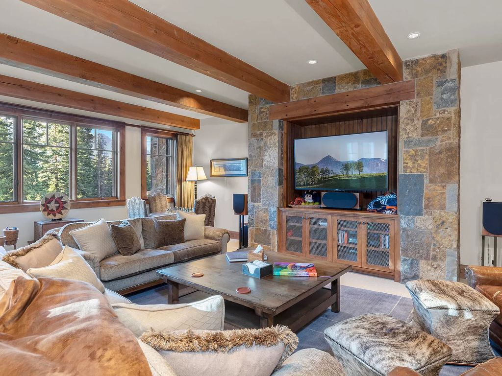 The Home in Mountain Village, a stunning retreat has a gorgeous outdoor living with main level expansive deck fit for large party entertaining, amazing views from all rooms. This home located at 522 Benchmark Dr, Mountain Village, Colorado.