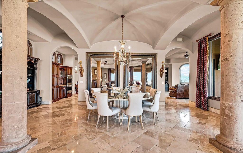 The Retreat in Gold Canyon, a grand Mediterranean estate on a nearly one-acre, ultra-private cul-de-sac site, surrounded by divine 180-degree views of the Superstition Mountains is now available for sale. This home located at 3968 S Calle Medio A Celeste #A, Gold Canyon, Arizona
