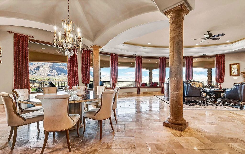 The Retreat in Gold Canyon, a grand Mediterranean estate on a nearly one-acre, ultra-private cul-de-sac site, surrounded by divine 180-degree views of the Superstition Mountains is now available for sale. This home located at 3968 S Calle Medio A Celeste #A, Gold Canyon, Arizona