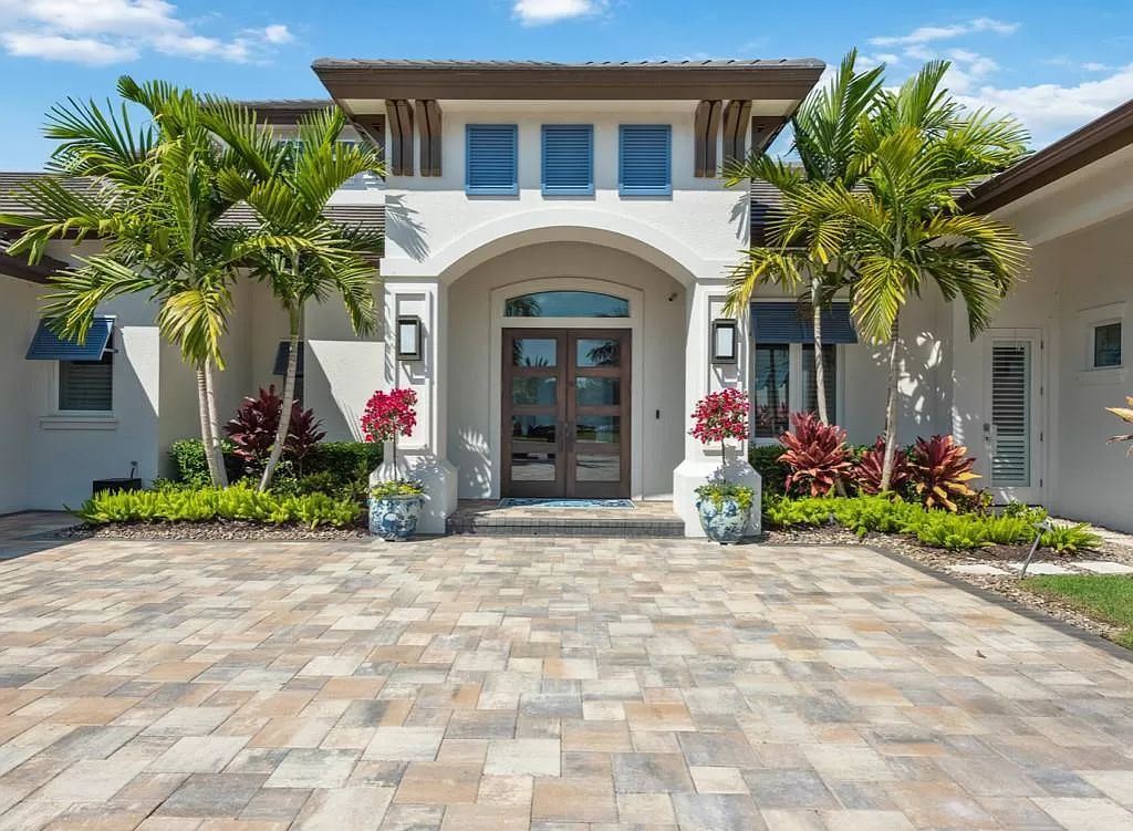 The Home in Miromar Lakes, a magnificent estate on a private waterfront peninsula showcases exquisite architectural details and an amazing outdoor oasis is now available for sale. This home located at 11910 Via Salerno Way, Miromar Lakes, Florida