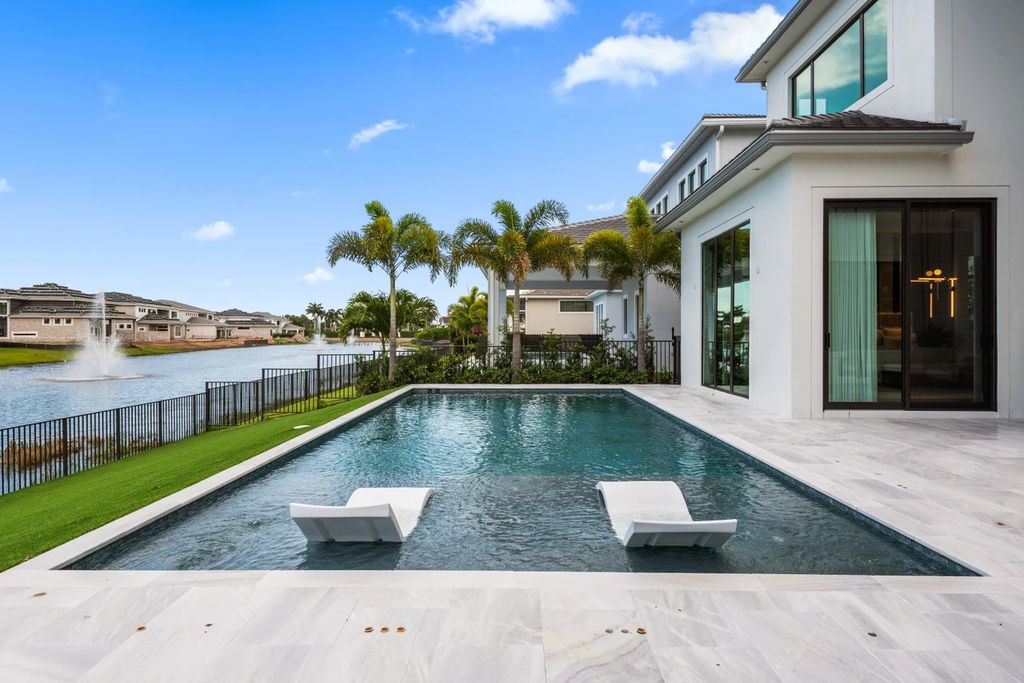 The Home in Boca Raton, the most exceptional home in Royal Palm Polo features luxurious wall coverings, custom built-ins and exquisite lighting is now available for sale. This home located at 7405 NW 27th Ave, Boca Raton, Florida