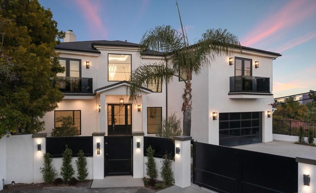The Residence in Los Angeles, a luxurious three-story home at the end of a desirable Brentwood cul de sac encouraging an indoor outdoor lifestyle. This home located at 12318 19th Helena Dr, Los Angeles, California.