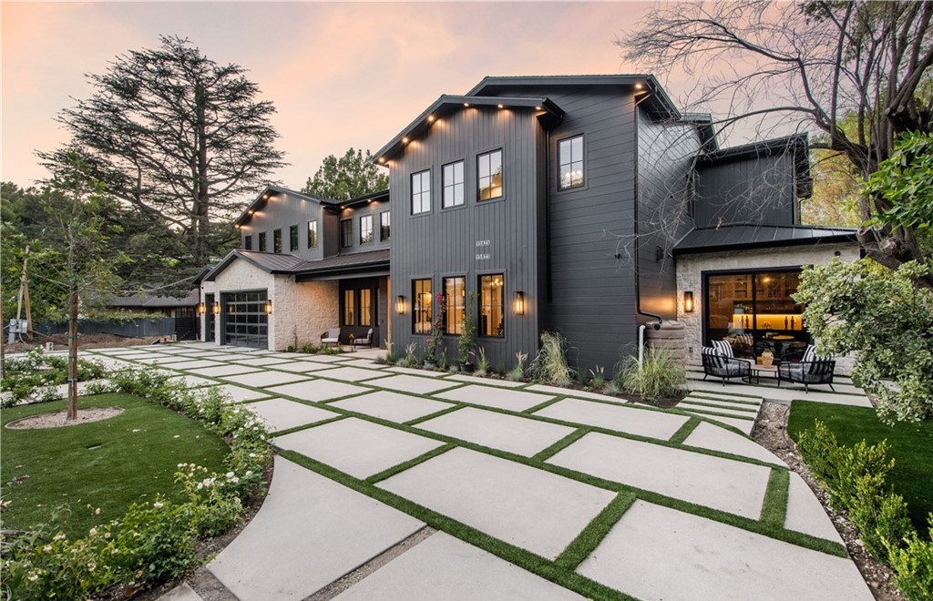 The Farmhouse in Encino, Exquisite new construction gated estate in the coveted enclave of Royal Oaks neighborhood with the sprawling grounds featuring a sparkling pool & spa, sports court, spacious elevated patio, grass area. This home located at 15825 Woodvale Rd, Encino, California