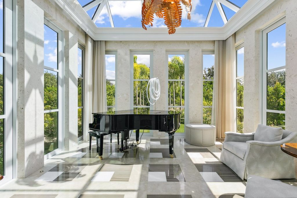 The Estate in Delray Beach, an extraordinary prestigious fully furnished custom home set prime lakefront site, open and mesmerizing T-shaped views. This home located at 16071 Quiet Vista Cir, Delray Beach, Florida.