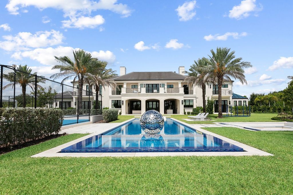 The Estate in Delray Beach, an extraordinary prestigious fully furnished custom home set prime lakefront site, open and mesmerizing T-shaped views. This home located at 16071 Quiet Vista Cir, Delray Beach, Florida.