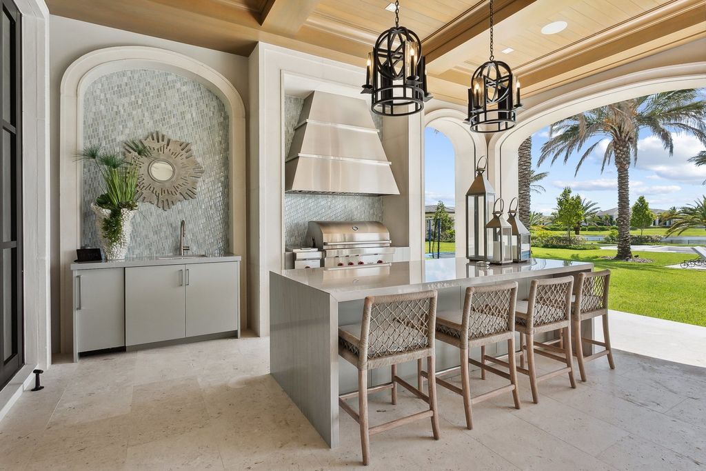 The Estate in Delray Beach, an extraordinary prestigious fully furnished custom home set prime lakefront site, open and mesmerizing T-shaped views. This home located at 16071 Quiet Vista Cir, Delray Beach, Florida.