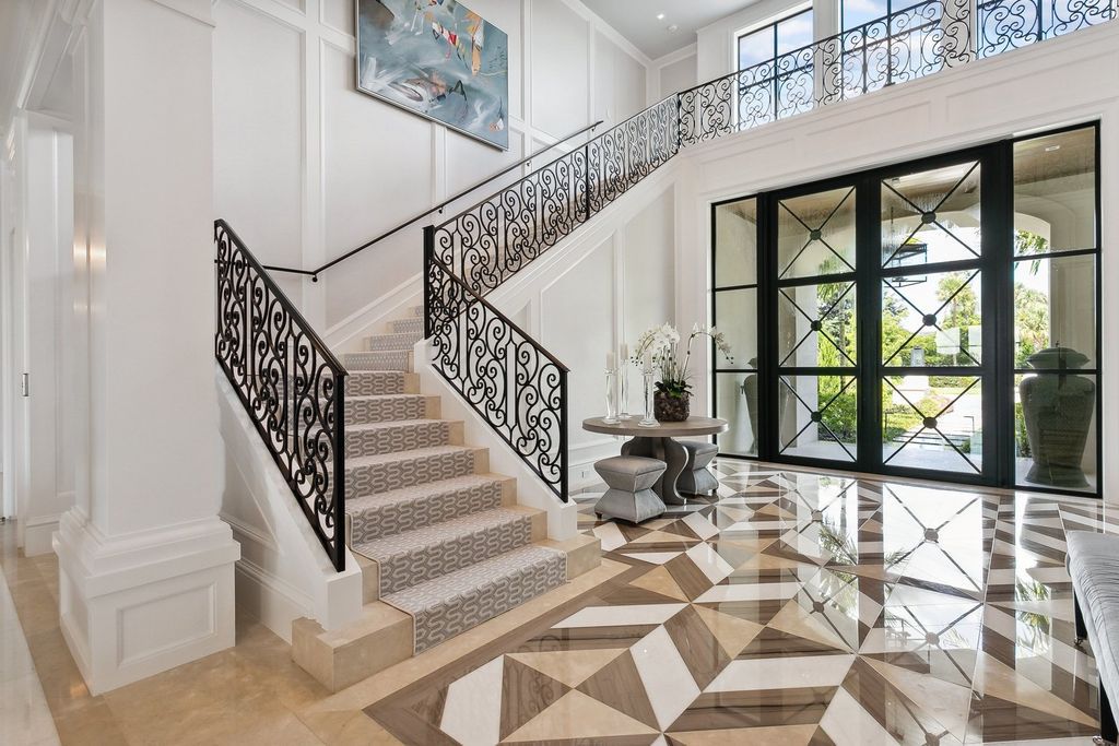 The Estate in Delray Beach, an extraordinary prestigious fully furnished custom home set prime lakefront site, open and mesmerizing T-shaped views. This home located at 16071 Quiet Vista Cir, Delray Beach, Florida.