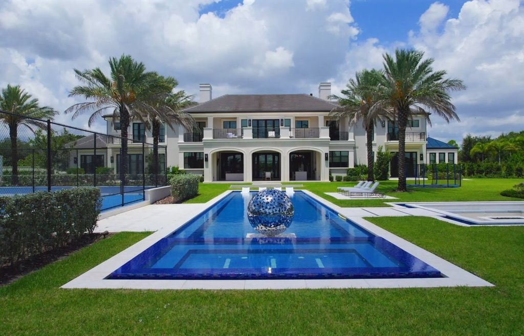 The Estate in Delray Beach, an extraordinary prestigious fully furnished custom home set prime lakefront site, open and mesmerizing T-shaped views. This home located at 16071 Quiet Vista Cir, Delray Beach, Florida.