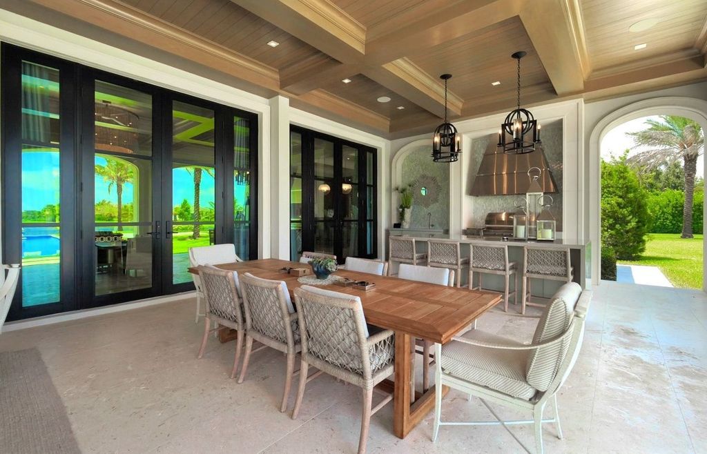 The Estate in Delray Beach, an extraordinary prestigious fully furnished custom home set prime lakefront site, open and mesmerizing T-shaped views. This home located at 16071 Quiet Vista Cir, Delray Beach, Florida.