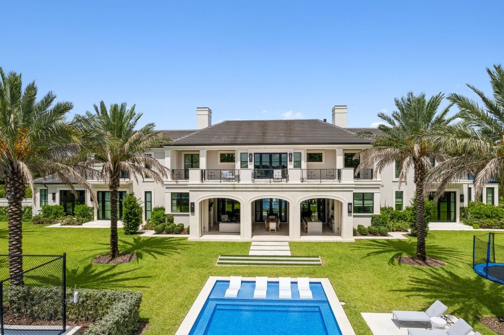 The Estate in Delray Beach, an extraordinary prestigious fully furnished custom home set prime lakefront site, open and mesmerizing T-shaped views. This home located at 16071 Quiet Vista Cir, Delray Beach, Florida.