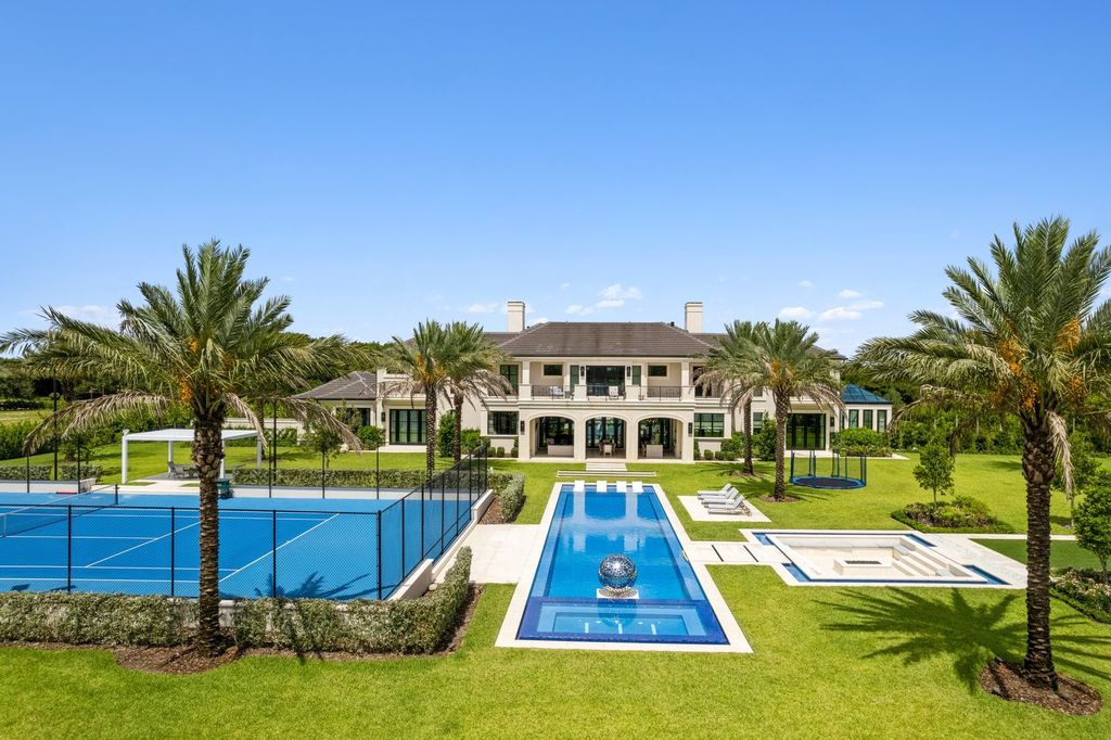 The Estate in Delray Beach, an extraordinary prestigious fully furnished custom home set prime lakefront site, open and mesmerizing T-shaped views. This home located at 16071 Quiet Vista Cir, Delray Beach, Florida.