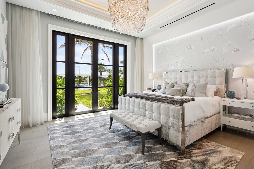 The Estate in Delray Beach, an extraordinary prestigious fully furnished custom home set prime lakefront site, open and mesmerizing T-shaped views. This home located at 16071 Quiet Vista Cir, Delray Beach, Florida.