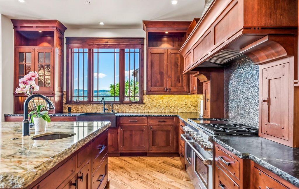 The Home in Park City, an amazing Russell Dye cabin has been extravagantly upgraded with all of the bells and whistles that you could dream of. This home located at 9207 Alice Ct, Park City, Utah.