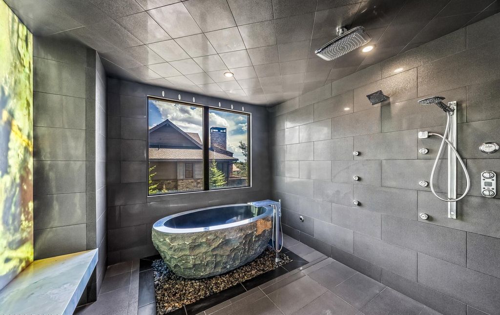 The Home in Park City, an amazing Russell Dye cabin has been extravagantly upgraded with all of the bells and whistles that you could dream of. This home located at 9207 Alice Ct, Park City, Utah.