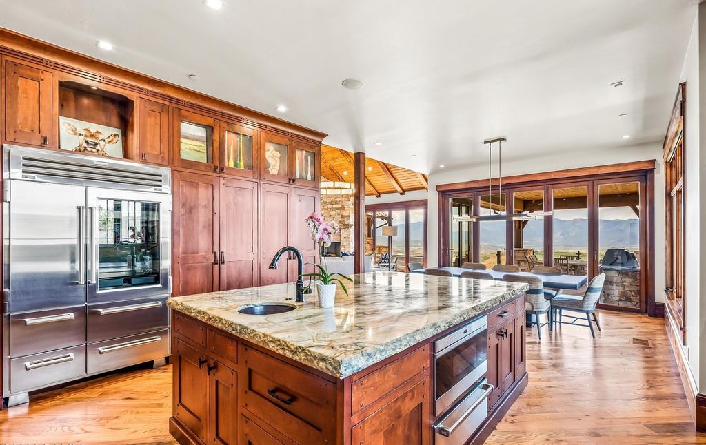 The Home in Park City, an amazing Russell Dye cabin has been extravagantly upgraded with all of the bells and whistles that you could dream of. This home located at 9207 Alice Ct, Park City, Utah.