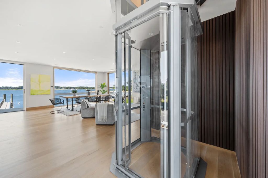 The House in Westport provides open floor plan & transparent railings on outdoor balconies/decks make for unobstructed views throughout, now available for sale. This home located at 135 Harbor Rd, Westport, Connecticut