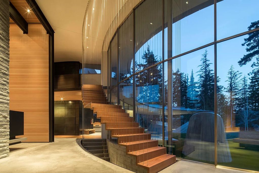 The House in Whistler commands attention with encompassing lake views, now available for sale. This home located at 5462 Stonebridge Dr, Whistler, BC V0N 1B3, Canada