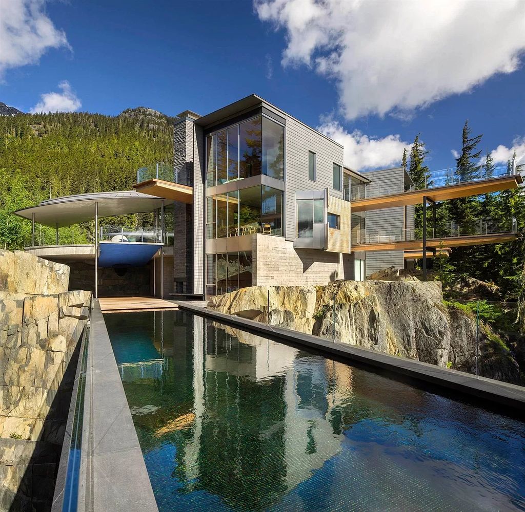 The House in Whistler commands attention with encompassing lake views, now available for sale. This home located at 5462 Stonebridge Dr, Whistler, BC V0N 1B3, Canada