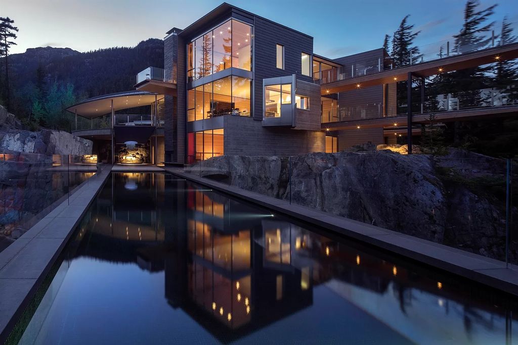 The House in Whistler commands attention with encompassing lake views, now available for sale. This home located at 5462 Stonebridge Dr, Whistler, BC V0N 1B3, Canada