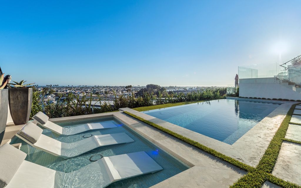 The Home in Corona Del Mar, a brand new construction trophy property on Dolphin Terrace was intricately curated with extreme elegance and sophistication is now available for sale. This home located at 1201 Dolphin Ter, Corona Del Mar, California