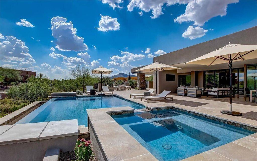 The Scottsdale Home, a brand new Mortensen Signature residence boasts natural elegance and contemporary desert flair. This home located at 10929 E Fortuna Dr, Scottsdale, Arizona