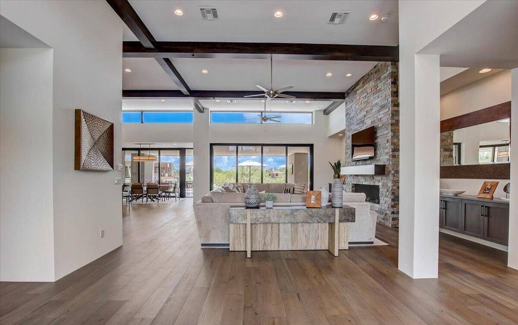 The Scottsdale Home, a brand new Mortensen Signature residence boasts natural elegance and contemporary desert flair. This home located at 10929 E Fortuna Dr, Scottsdale, Arizona