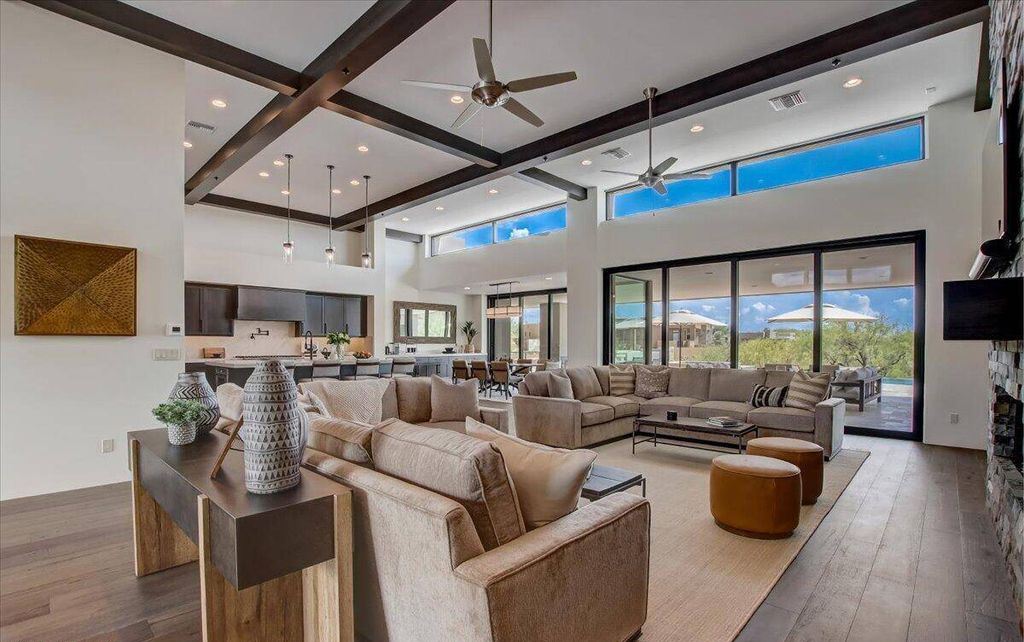 The Scottsdale Home, a brand new Mortensen Signature residence boasts natural elegance and contemporary desert flair. This home located at 10929 E Fortuna Dr, Scottsdale, Arizona