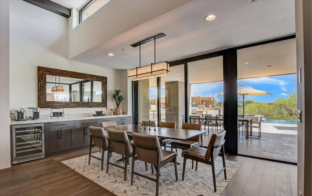 The Scottsdale Home, a brand new Mortensen Signature residence boasts natural elegance and contemporary desert flair. This home located at 10929 E Fortuna Dr, Scottsdale, Arizona