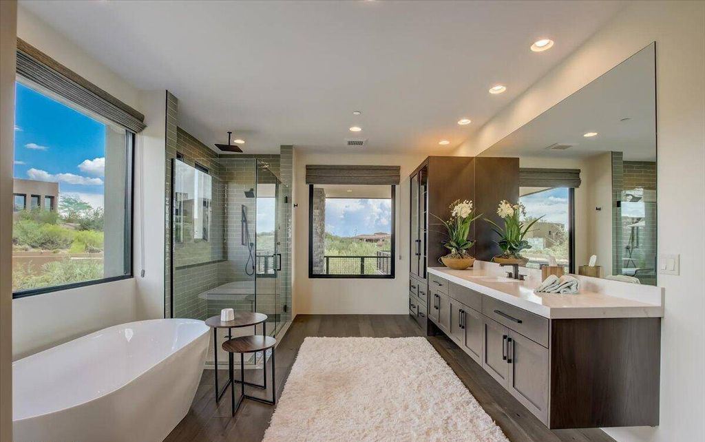 The Scottsdale Home, a brand new Mortensen Signature residence boasts natural elegance and contemporary desert flair. This home located at 10929 E Fortuna Dr, Scottsdale, Arizona