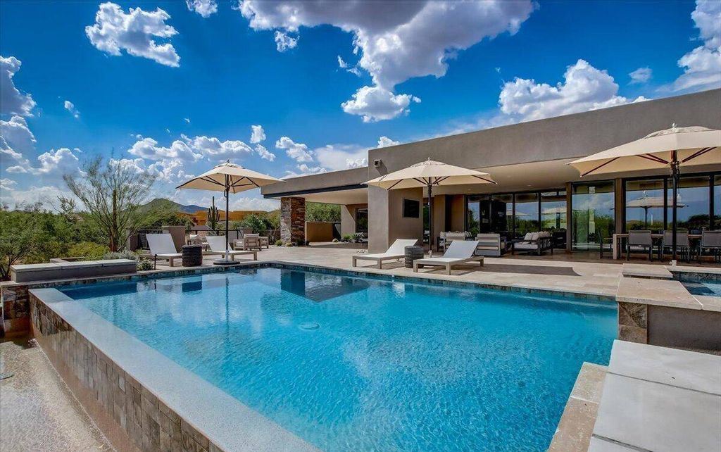 The Scottsdale Home, a brand new Mortensen Signature residence boasts natural elegance and contemporary desert flair. This home located at 10929 E Fortuna Dr, Scottsdale, Arizona