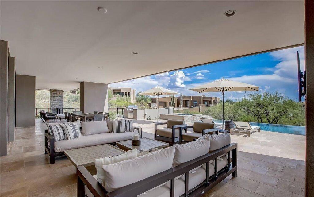 The Scottsdale Home, a brand new Mortensen Signature residence boasts natural elegance and contemporary desert flair. This home located at 10929 E Fortuna Dr, Scottsdale, Arizona