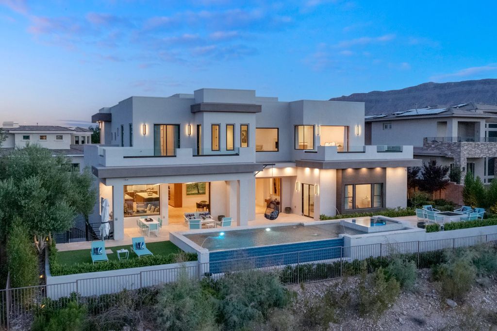 The Home in Las Vegas, a dramatic custom masterpiece with panoramic Red Rock Conservation views defines modern sophistication with sleek timeless finishes is now available for sale. This house located at 74 Meadowhawk Ln, Las Vegas, Nevada
