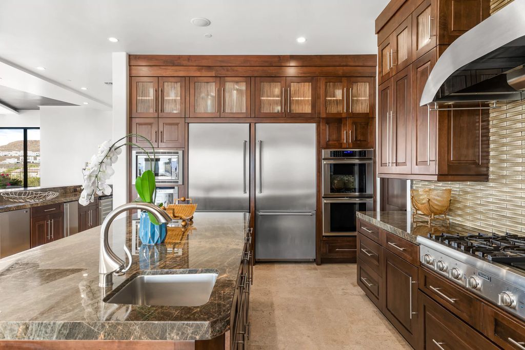 The Henderson Home, a newly renovated double-gated residence spotlights high ceilings, curved staircases, an open floor plan and an amazing outdoor area is now available for sale. This home located at 578 Lairmont Pl, Henderson, Nevada