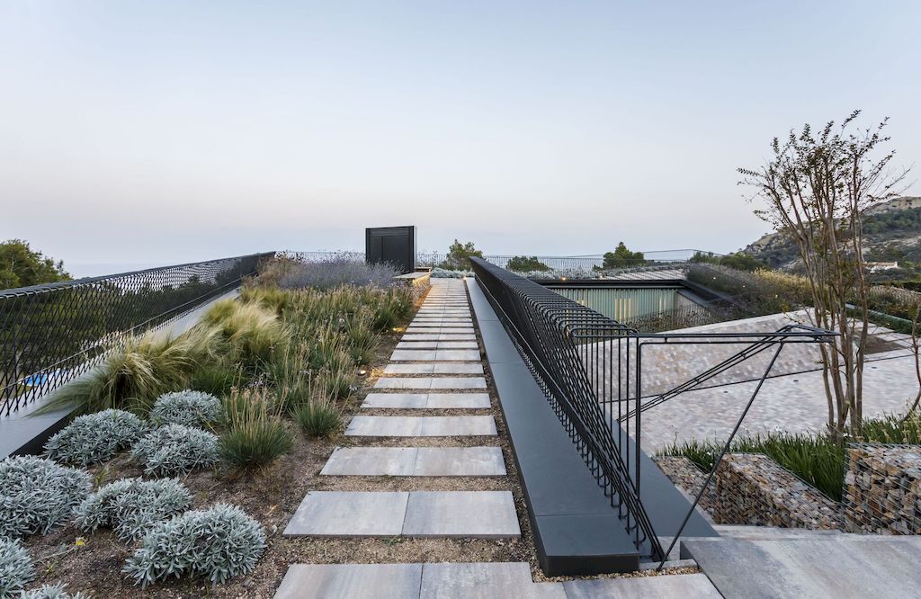 Happy House in Begur integrates environment by SALA Ferusic Architects